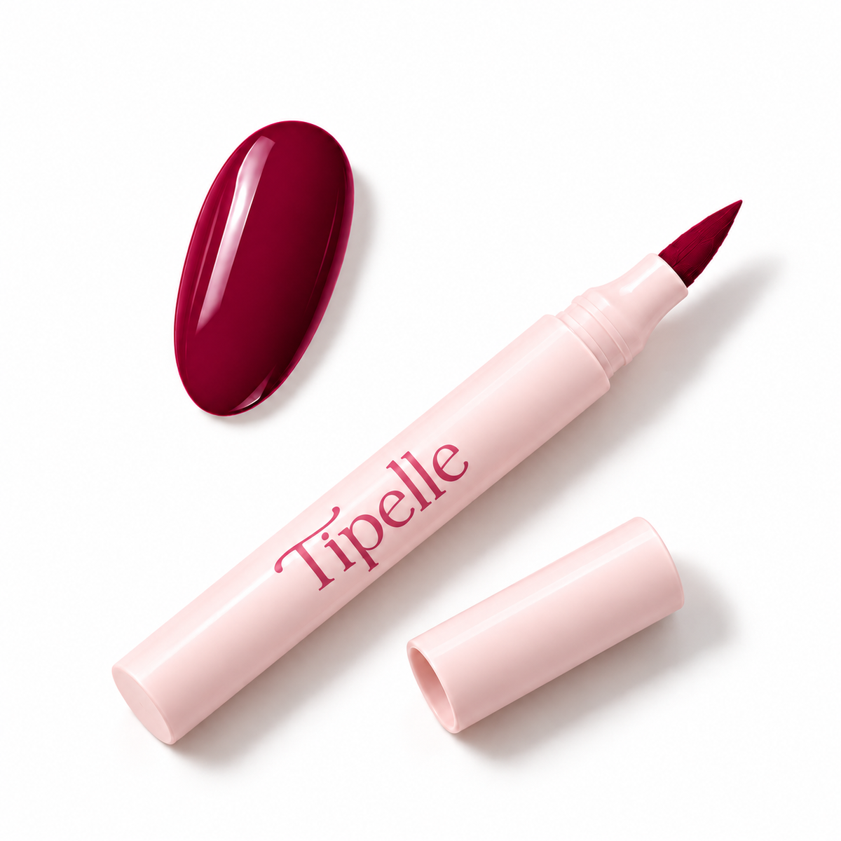 Tipelle Raspberry Nail Pen in pink packaging with matching shade sample