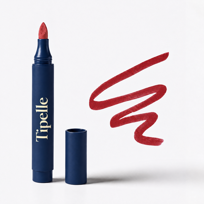 Tipelle juicy lip pen navy buttercream original upright composition