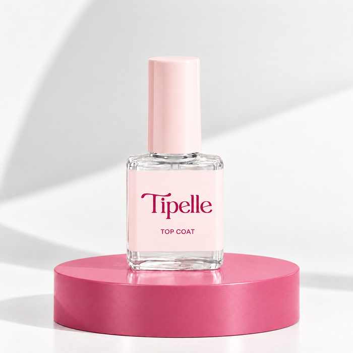 Tipelle Top Coat bottle on a rose pink plinth